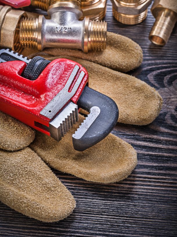 red-pipe-wrench-with-brass-plumbing-fittings-2026-03-26-07-51-18-utc